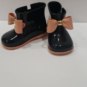 Black and pink mini melissa bow booties